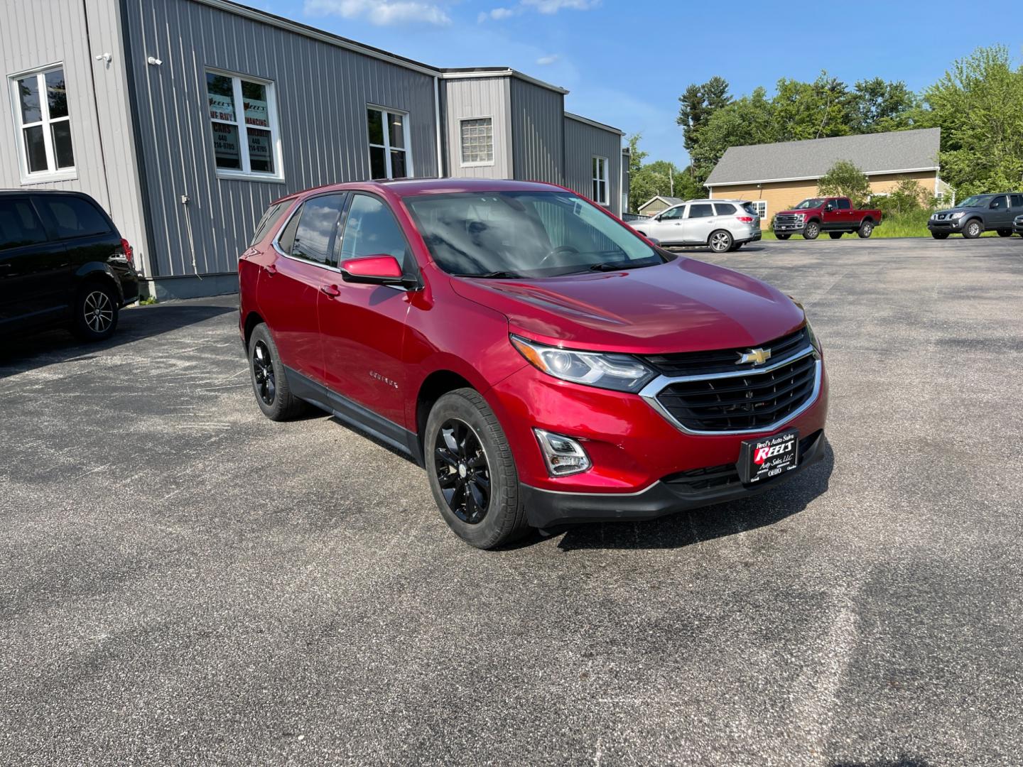 2018 Red /Black Chevrolet Equinox LT AWD (2GNAXSEV2J6) with an 1.5L I4 DOHC 16V TURBO engine, 6-Speed Automatic transmission, located at 11115 Chardon Rd. , Chardon, OH, 44024, (440) 214-9705, 41.580246, -81.241943 - This 2018 Chevrolet Equinox LT AWD with a 1.5L EcoTec Turbocharged engine and 6-speed automatic transmission offers a balanced blend of performance and fuel efficiency with a 30 MPG highway rating. This compact SUV is well-equipped for safety and convenience, featuring blind spot monitoring, rear cr - Photo#2